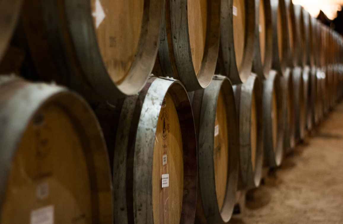 why is whiskey stored in wooden barrels 1
